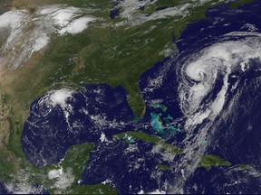 Hurricane Cristobal is seen off the east coast of the United States in an image taken from NOAA's Goes-East satellite at 0907EDT/1307GMT August 27, 2014. Hurricane Cristobal continued moving north and its center is expected to pass well west of Bermuda on Wednesday, where a tropical storm watch is in effect and heavy rain is likely, the National Hurricane Center said.  REUTERS/NOAA/Handout via Reuters