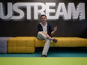 Gyula Feher, co-founder of the Ustream, poses for a photo at its headquarters in Budapest downtown on Aug. 26, 2014. (AFP PHOTO/ATTILA KISBENEDEK)
