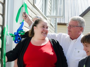 Single mother of two, Connie Matthews received the keys to her new home on Friday. After months of hard work Habitat for Humanity Prince Edward Hastings completed the construction of its 15th home. August 29, 2014, Picton On. Lacy Gillott/TheIntelligencer/QMI Agency.