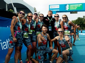 Jen Panteluk, shown here on the right in a group of competitors posing with Simon Whitfield, says her competition background and business education gave her a unique perspective among the organizers. (Supplied)