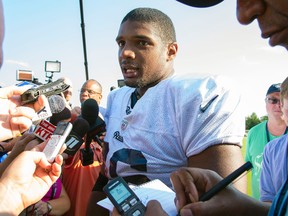 St. Louis Rams defensive lineman Michael Sam (96) addresses the press after practice at Rams Park on July 29, 2014. (SCOTT ROVAK/USA TODAY Sports)