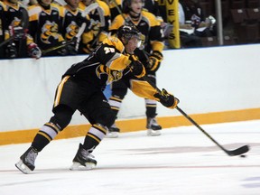 Pavel Zacha, Sarnia's 1st overall selection in the 2014 CHL Import Draft, makes a  pass during the team's annual United Way Black and White Game on Friday, August 29. The game signalizes the official end of training camp, and the roster will be trimmed to close to 25 players by Saturday morning. Zacha had a goal and an assist in the game, which raised $2786 for the United Way. (SHAUN BISSON, The Observer)