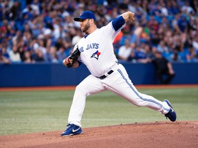 Toronto Blue Jays starting pitcher Mark Buehrle throws against the New York Yankees at the Rogers Centre in Toronto, Aug. 29, 2014. (NICK TURCHIARO/USA Today)