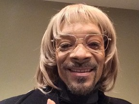 Snoop Dogg posted images and videos of himself wearing a wig, glasses and whiteface make-up on his Instagram account. (snoopdogg/Instagram)