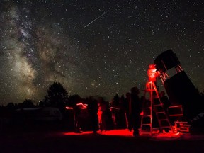 Sibby Sutty/For The Sudbury Star
This Manitoulin Star Party photo was taken last summer at Gordon's Park RASC designated Dark Sky Preserve. This Labour Day Weekend includes camping in the preserve, presentations, public observing sessions, laser guided sky tours. Here is the stunning August Milky Way, the large telescope and astronomers observing the Dark Sky Preserve.