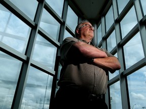 RCMP Staff Sgt. Ron Campbell poses for a photo at RCMP K Division, in Edmonton Alta., on Wednesday Aug. 20, 2014. David Bloom/Edmonton Sun/QMI Agency