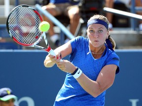 Petra Kvitova returns a shot to Aleksandra Krunic during third round action at the U.S. Open in New York on Saturday, Aug. 30, 2014. (Anthony Gruppuso/USA TODAY Sports)