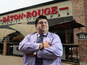 Kanata Baton Rouge owner Anwar Ibrahimposes for a photo in Ottawa Monday Aug 18,  2014. Anwar is concerned that the minimum wage increase is putting a strain on operations. 
Tony Caldwell/Ottawa Sun/QMI Agency