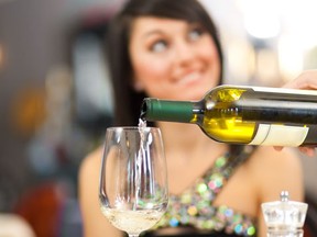 Wine only protects against heart disease in people who exercise, study says. (Fotolia)