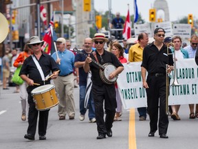 The annual Labour Day Parade heading down Elgin Street in Ottawa. September 2, 2013. Errol McGihon/Ottawa Sun/QMI Agency