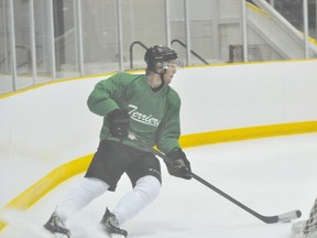 Portage Terriers defenceman Brett Orr takes the puck behind the net during Terriers training camp Aug. 31. (Kevin Hirschfield/THE GRAPHIC)
