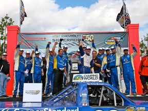 Ryan Blaney and his No. 29 Brad Keselowski Racing Ford F-150 team celebrate on the podium after winning the NASCAR Camping World Truck Series Chevrolet Silverado 250 on Sunday at Canadian Tire Motorsports Park in Bowmanville. It was the 20-year-old’s second win of the season. (JOHN WALKER/PHOTO)