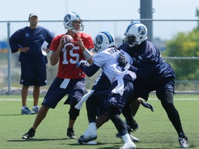 Ricky Ray looks downfield as the Argos prepare for Monday’s Labour Day Classic against the Tiger-Cats. (Jack Boland/Toronto Sun)