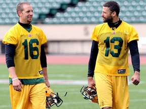 (left to right) Matt Nichols and Mike Reilly leave the field following Day 6 of the Edmonton Eskimos' 2013 Training Camp at Commonwealth Stadium, in Edmonton, Alta. on Friday June 7, 2013. David Bloom/Edmonton Sun/QMI Agency