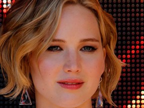 Cast member Jennifer Lawrence poses during a photocall for the film "The Hunger Games : Mockingjay - Part 1" at the 67th Cannes Film Festival in Cannes May 17, 2014. (Chris.K/WENN.com)