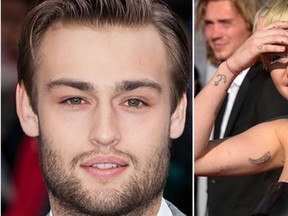 Miley Cyrus and British actor Douglas Booth are dating, according to a U.K. report.(WENN/Reuters)