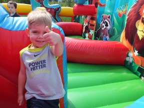 Fraser Philipsen takes a break from bouncing around to give a thumbs up at the Festival of Good Things in Sarnia this weekend. BRENT BOLES / THE OBSERVER