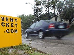 A sign advertising prevent ticket.com, which sells an anti-photo radar spray, is seen on Kenaston Boulevard north of Grant Avenue on Sun., Aug. 31, 2014. (Kevin King/Winnipeg Sun/QMI Agency)