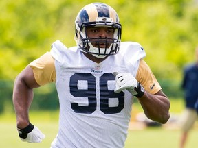 Michael Sam runs during Rams rookie minicamp in St. Louis on May 16, 2014. (Scott Rovak/USA TODAY Sports/Files)