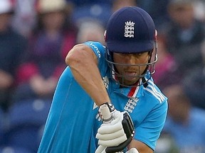 England’s Alastair Cook plays the ball during the second one-day international cricket match between England and India at the Glamorgan County Cricket Ground in Cardiff, Wales. (AFP)