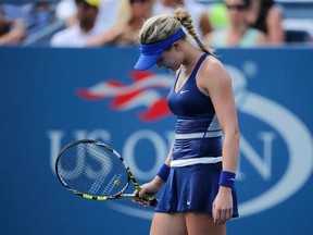Eugenie Bouchard reacts after a missed point against Ekaterina Makarova during their U.S. Open match in New York on Monday, Sept. 1, 2014. (Eduardo Munoz/Reuters)