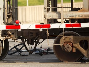 A 47-year-old woman is lucky to be alive after colliding with a freight train at the Florence and Highbury CN rail crossing. (MIKE HENSEN, The London Free Press)