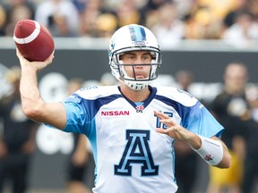 Argonauts quarterback Ricky Ray unloads against the Hamilton Tiger-Cats on Monday afternoon. (Fred Thornhill/Reuters)