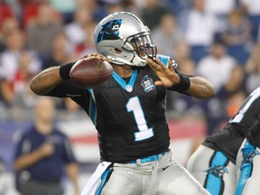 Carolina Panthers quarterback Cam Newton passes against the New England Patriots during a pre-season game at Gillette Stadium in Foxborough, Mass., Aug. 22, 2014. (STEW MILNE/USA Today)