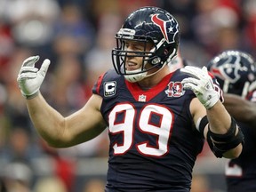 Houston Texans defensive end J.J. Watt is reportedly set to become the NFL's highest-paid defender after signing a $100 million contract extension. (Reuters)