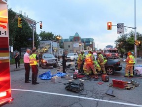 Ottawa firefighters and paramedics work at the scene of a serious two-vehicle crash at Montreal Rd. and Marier Ave. Tuesday morning. Two people had to be cut out of the vehicle, and a total of three were taken to hospital. (Ottawa Fire Dept. submitted image)​