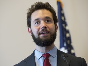 Alexis Ohanian, investor and founder of Reddit, speaks about net neutrality for the Internet during a discussion hosted by the Free Press Action Fund on Capitol Hill in Washington on July 8, 2014.    AFP PHOTO / Saul LOEB