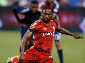 Jermain Defoe scores on a penalty kick in the second half to put TFC up 1-0 against the Vancouver Whitecaps FC at BMO Field on Wednesday July 16, 2014. (Craig Robertson/Toronto Sun)