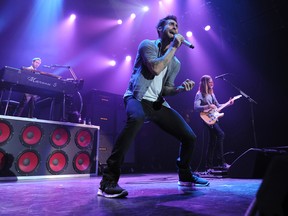 Singer Adam Levine of Maroon 5 sings at Rexall Place in Edmonton, Alberta, Sept. 10, 2011. Maroon 5 is coming back to Edmonton March March 26, 2015. Usher is in Edmonton in a few months, on Nov. 30. (EDMONTON SUN FILE)