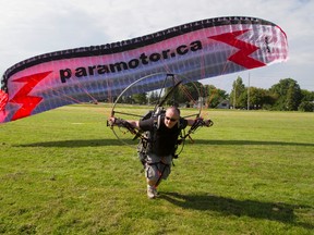 Darek Magusiak shows how to fly his 10m wing in London, Ont. on Friday August 29, 2014. Magusiak will be teaching others how to fly these rigs. (MIKE HENSEN, The London Free Press)