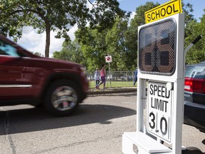A speed sign is seen outside of Westglen School in Edmonton, Alta., on Tuesday, Sept. 2, 2014. School zones are in effect across the city. Edmonton Police Service officers will begin ticketing drivers speeding in the zones on Oct. 21. Ian Kucerak/Edmonton Sun/ QMI Agency