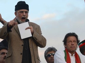 Tahir-ul-Qadri addresses supporters on Sept. 2. (AFP PHOTO)
