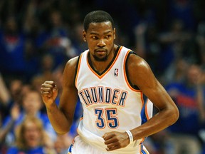 Oklahoma City Thunder forward Kevin Durant reacts after sinking a shot against the Memphis Grizzlies at Chesapeake Energy Arena in Oklahoma City, May 3, 2014. (MARK D. SMITH/USA Today)