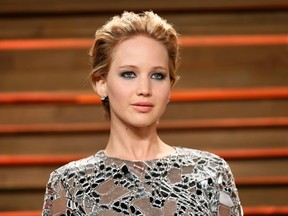 Actress Jennifer Lawrence arrives at the 2014 Vanity Fair Oscars Party in West Hollywood, California March 2, 2014.  REUTERS/Danny Moloshok