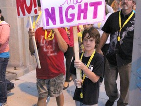 Aiden Frais, 10, was among nearly 100 people walking in the annual Take Back the Night march in 2013. This year's march is set for Sept. 18 at 7 p.m. Marchers are asked to gather at the Peace Court on Lochiel Street. (FILE PHOTO)