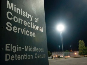 High fence lines the outside of the Elgin-Middlesex Detention Centre, a maximum security prison on Exeter Road, in London on Wednesday July 25, 2012. (CRAIG GLOVER/ QMI AGENCY)