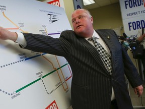 Mayor Rob Ford lays out his future subway vision at his Etobicoke campaign office on Wednesday, Sept. 3, 2014. (DAVE THOMAS/Toronto Sun)