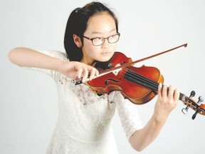 Young London violinist Sarah Chun, 12, already is a musical force here and across the border in Michigan. (MORRIS LAMONT, The London Free Press)