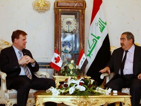 Canadian Foreign Minister John Baird, left, meets with Iraqi Foreign Minister Hoshyar Zebari in Baghdad on September 3, 2014. (REUTERS/Ahmed Saad)