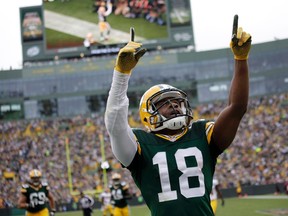 Green Bay Packers wide receiver Randall Cobb celebrates his touchdown against the Washington Redskins on September 15, 2013. (REUTERS/Darren Hauck)