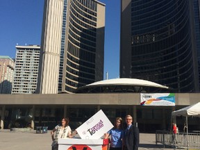 Organizers of proudTOvote unveil a giant, rainbow ballot box in front of City Hall on Thursday, Sept. 4, 2014. (DON PEAT/Toronto Sun)