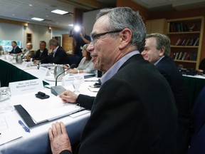 Canada's Finance Minister Joe Oliver takes part in a summer policy retreat in Wakefield, Quebec August 12, 2014. (REUTERS/Chris Wattie)