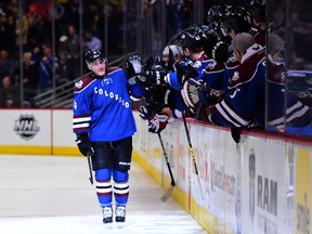 Colorado Avalanche defenceman Tyson Barrie celebrates with teammates after scoring a goal during a shootout against the New York Rangers at Pepsi Center on April 3, 2014. (Ron Chenoy/USA TODAY Sports)