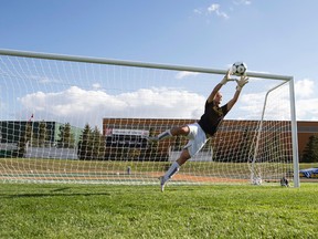 Pandas coach Liz Jepsen points to Kelti Biggs's athleticism as a strength in net. (Ian Kucerak, Edmonton Sun)