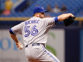 Toronto Blue Jays starting pitcher Mark Buehrle (56) throws a pitch during the first inning against the Tampa Bay Rays at Tropicana Field on Sep 4, 2014 in St. Petersburg, FL, USA. (Kim Klement/USA TODAY Sports)