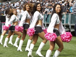 Oakland Raiders cheerleaders perform on the sidelines during the first quarter against the Jacksonville Jaguars at O.co Coliseum on October 21, 2012 in Oakland, California. (Jason O. Watson/Getty Images/AFP)